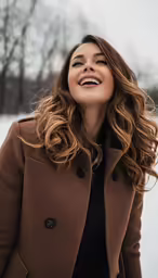 a woman that is standing in the snow