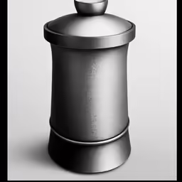 a gray object sitting on top of a white table