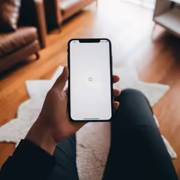 a person holding a phone with the case up