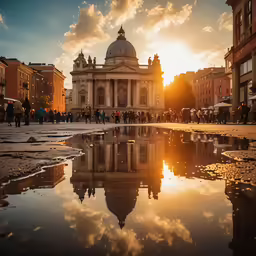 a very pretty reflection of the building on a very reflective puddle