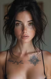 a young girl is posing for a photograph with tattoos on her chest,a woman with a tattoo that has been tattooed
