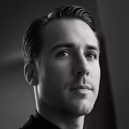 black and white photograph of a man with a suit and tie