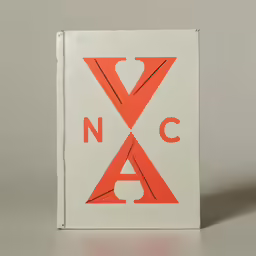 the small red and black letter is on a small white card