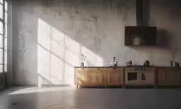 a couple of windows in a concrete wall next to two cabinets