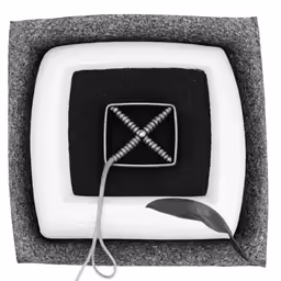 an old television with a wire tied to it