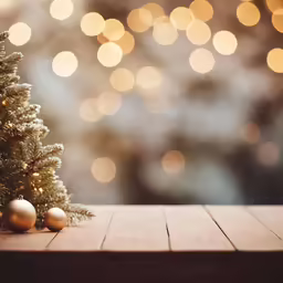 a small tree on a table with lights