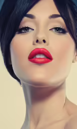 a woman in black with red lipstick on her lips
