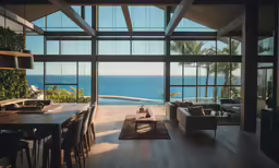 a living room with a large table and chairs in front of a window