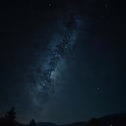 the night sky filled with stars and bright bright lights