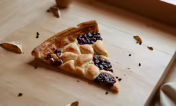 half eaten piece of pie sitting on a table