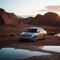 the silver vehicle is driving down the dirt road