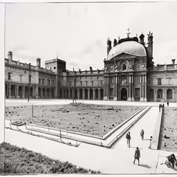 a large building with a large courtyard in front of it
