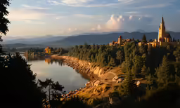 the castle is surrounded by trees near the water
