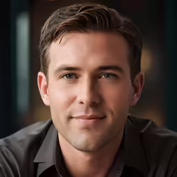 a close up of a male with short hair