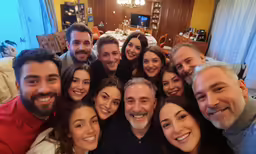 a group of people posing for the camera