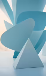 a sculpture is pictured against a pale background