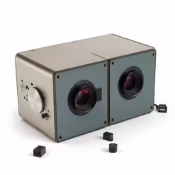 a black and silver object with a camera attached