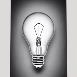 a light bulb hanging from a wall in the dark