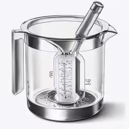an open measuring cup with a thermometer inside