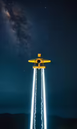 a tall yellow airplane sitting on top of a runway