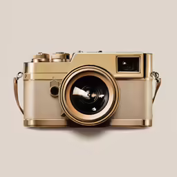 a silver and gold camera with an open lens
