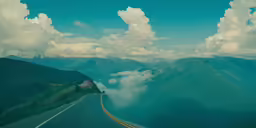 the highway is driving along the side of the mountain