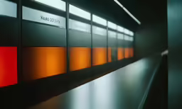 an industrial wall features orange and red colors