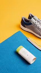 a shoe with two strings, a blue cloth and white shoe