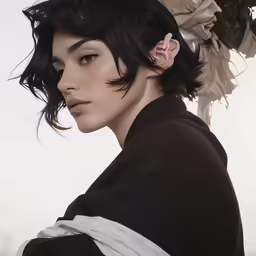 woman with black shirt and white scarf on head