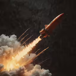 an orange rocket is flying through the sky