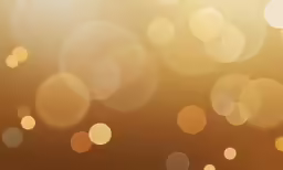 blurry, circular shapes in gold and orange