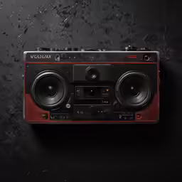 an old fashioned radio and speakers on a black surface