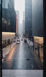 a street with cars and buildings during the day