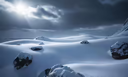 sun shining through the sky over some snowy hills