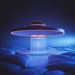 a blue and purple light that is inside of a lamp