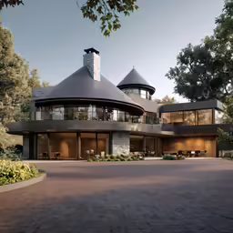 the big round house has two stories and a courtyard