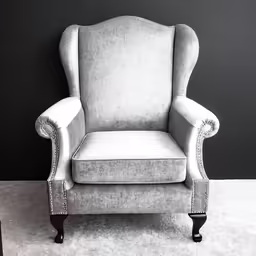 an armchair with nails is shown in black and white