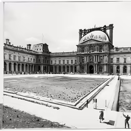 a black and white image of a large building