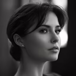 a black and white photo of a woman