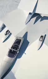 two vehicles are sitting on the concrete