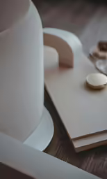 a notebook and other items sitting on a table