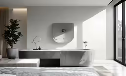 an elegant bathtub made out of concrete sits on the floor near a bed