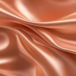 shiny orange fabric textured as a background