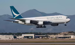 a large passenger airplane taking off from an airport runway