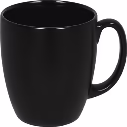 the black mug is sitting next to a white background