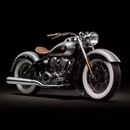 a motorcycle sitting on top of a dark ground
