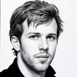 a black and white photo of a man with short hair
