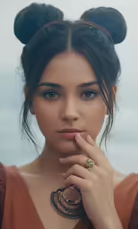 an image of a beautiful young woman with a bun on her head