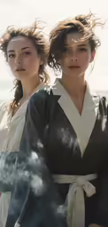 two women dressed in geisha style clothing