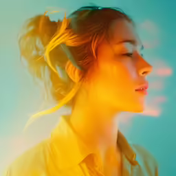 the woman with her hair in a bun is dressed up